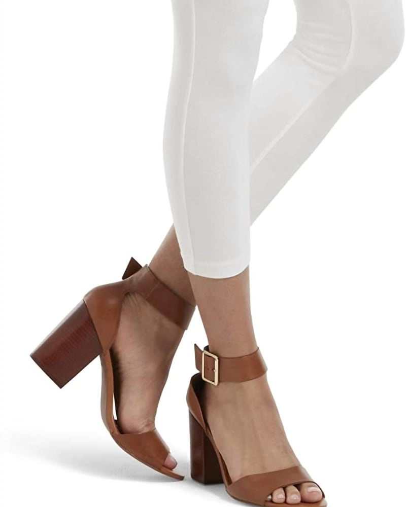 Front of a model wearing a size XL Women'S Wide Waistband Blackout Cotton Capri Leggings in White in White by HUE. | dia_product_style_image_id:341491